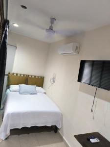 Llit o llits en una habitació de Dalia