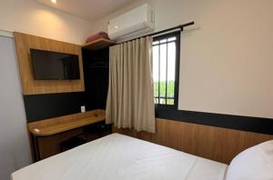 Postel nebo postele na pokoji v ubytování Ex Hotels Baus