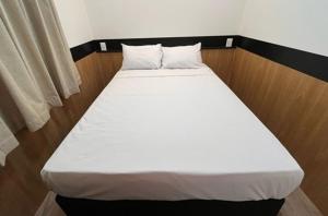 Postel nebo postele na pokoji v ubytování Ex Hotels Baus + 3 fotografie