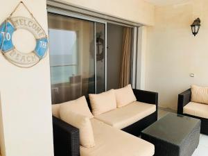 Uma área de estar em Atlas Ocean View Vue Mer Directe