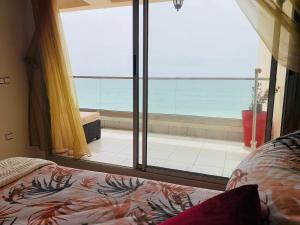 Cama ou camas em um quarto em Atlas Ocean View Vue Mer Directe