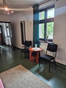Posezení v ubytování Hostel Dobranocka