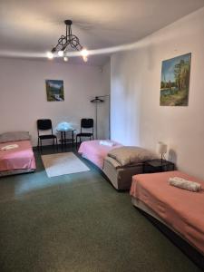Postel nebo postele na pokoji v ubytování Hostel Dobranocka