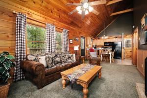 A seating area at Pet friendly, king bedrooms, smart TVs, pool table, theater room, and hot tub!