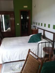 Postel nebo postele na pokoji v ubytování Casa Virgilio