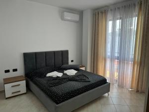 Postel nebo postele na pokoji v ubytování Orkidea Apartments