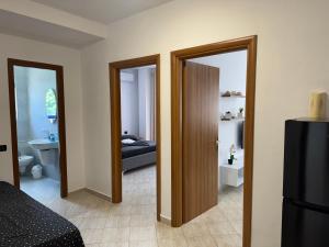 Postel nebo postele na pokoji v ubytování Orkidea Apartments