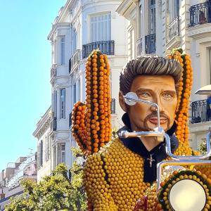 a large statue of a man with oranges on it at La 34 Tiny House with sunny terrace in Menton +15 photos