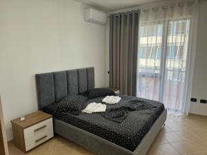 Postel nebo postele na pokoji v ubytování Orkidea Apartments