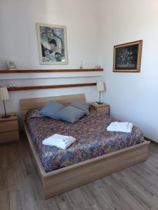 Ένα ή περισσότερα κρεβάτια σε δωμάτιο στο Casa Lilla a Firenze +25 φωτογραφίες