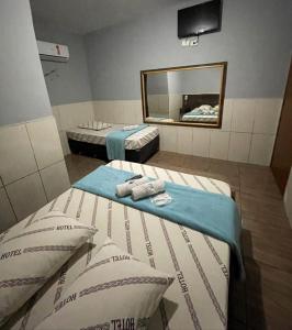 Postel nebo postele na pokoji v ubytování Hotel xandu-proximo arena corinthians + 2 fotografie