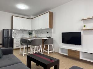 Kuchyň nebo kuchyňský kout v ubytování Orkidea Apartments