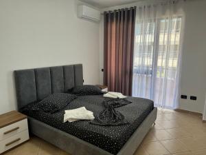 Postel nebo postele na pokoji v ubytování Orkidea Apartments