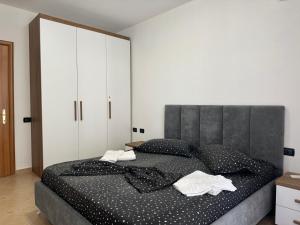 Postel nebo postele na pokoji v ubytování Orkidea Apartments