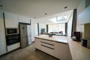 A kitchen or kitchenette at The Ni Villas Akyarlar - Bodrum