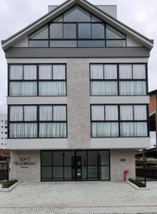 a large building with a lot of windows at Loft Bamberg 201-Pomerode in Pomerode
