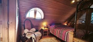 Łóżko lub łóżka w pokoju w obiekcie Domek Raj Zakopane