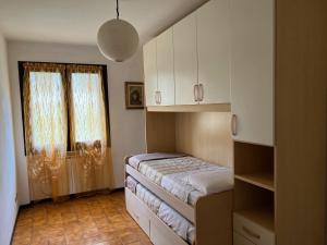 Ένα ή περισσότερα κρεβάτια σε δωμάτιο στο Al glicine