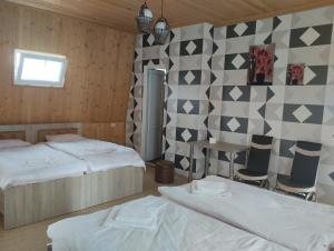Postel nebo postele na pokoji v ubytování Guesthouse Achi