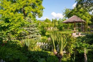 a garden with a gazebo and plants at Holiday Home Ruben in Odzun