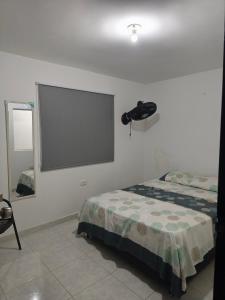 Postel nebo postele na pokoji v ubytování Apto moderno con comodidad total + 12 fotografií