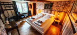 Postel nebo postele na pokoji v ubytování Roastineer Hotel
