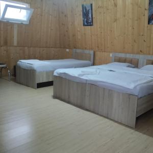 Postel nebo postele na pokoji v ubytování Guesthouse Achi