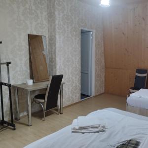 Postel nebo postele na pokoji v ubytování Guesthouse Achi
