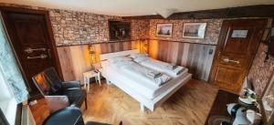 Postel nebo postele na pokoji v ubytování Roastineer Hotel