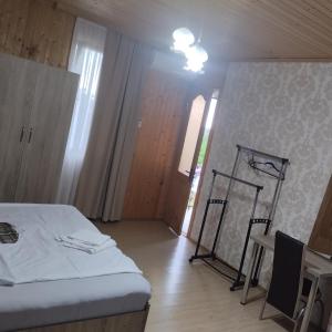 Postel nebo postele na pokoji v ubytování Guesthouse Achi