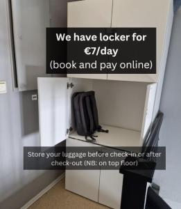 a sign that says we have locker for friday book and pay online at Oslo Stay guesthouse in Oslo