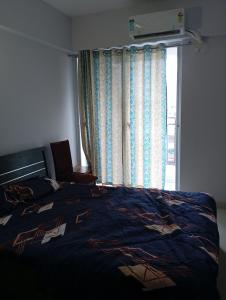 Postel nebo postele na pokoji v ubytování Pimple Saudagar 2bhk
