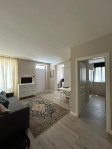 a living room with a couch and a table at Casa CaBì in Senigallia