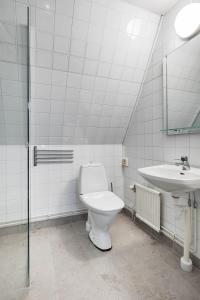 Koupelna v ubytování Villa Gutebagge Hotell