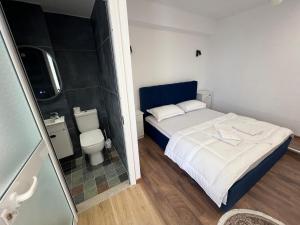 Rúm í herbergi á Iart Residence