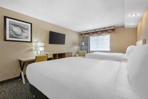 Postel nebo postele na pokoji v ubytování Best Western Cooperstown + 30 fotografií