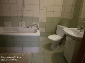 Koupelna v ubytování Dom Kącik