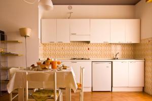 Η κουζίνα ή μικρή κουζίνα στο Appartamento Con Terrazza