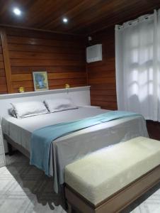 Katil atau katil-katil dalam bilik di Angra Pier600 Casa 2 beira mar