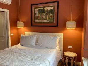 Postel nebo postele na pokoji v ubytování Villa Di Malpasso