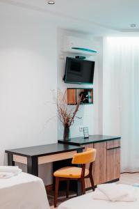 TV o dispositivi per l'intrattenimento presso Hotel Blini