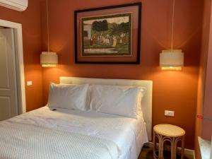 Postel nebo postele na pokoji v ubytování Villa Di Malpasso