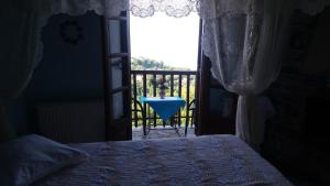 Postel nebo postele na pokoji v ubytování Diogenis Hotel