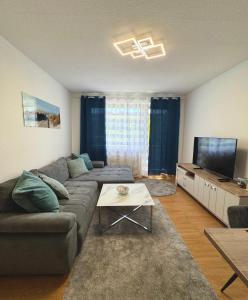 Posezení v ubytování Modern & Comfortable Apartment Greifswald