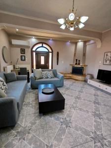 Χώρος καθιστικού στο Sunrise Suite