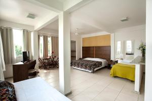 Katil atau katil-katil dalam bilik di Caiçara Flats +36 gambar