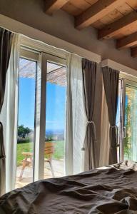 Posteľ alebo postele v izbe v ubytovaní B&B Cà Montemezzano
