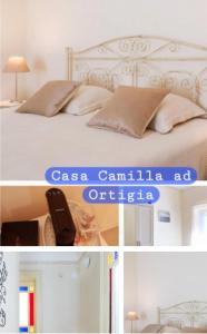 a white bed with pillows and a sign that says casa cranilla o at Casa Camilla in Siracusa