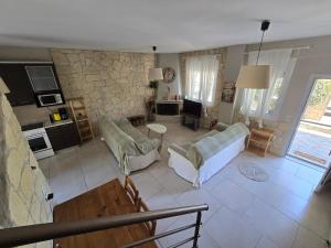 Un lugar para sentarse en Kalithea Summer Maisonette