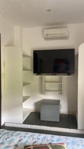 TV/trung tâm giải trí tại Espetacular casa para família! +19 ảnh